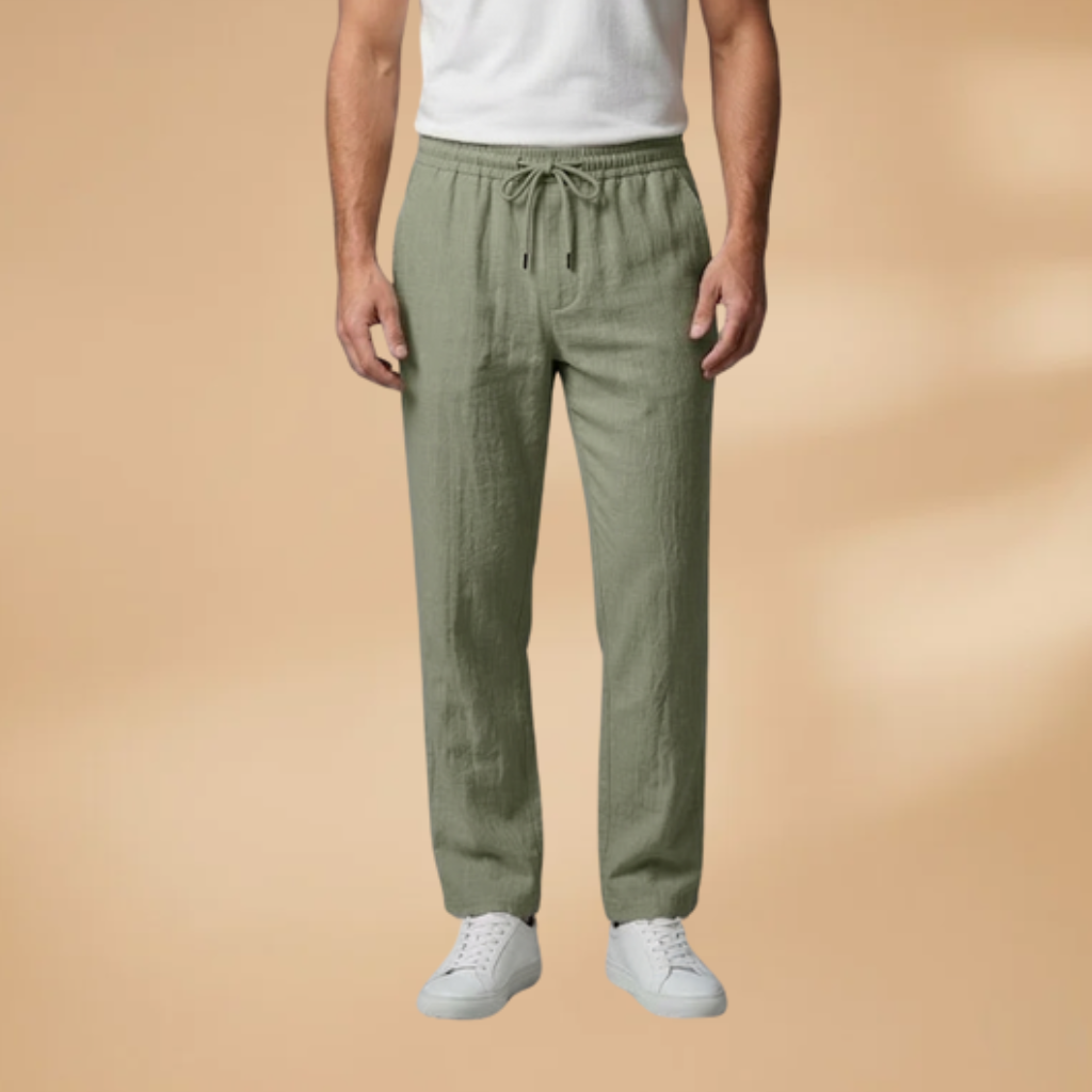 Man demonstrating the ease of movement in relaxed fit drawstring trousers.
