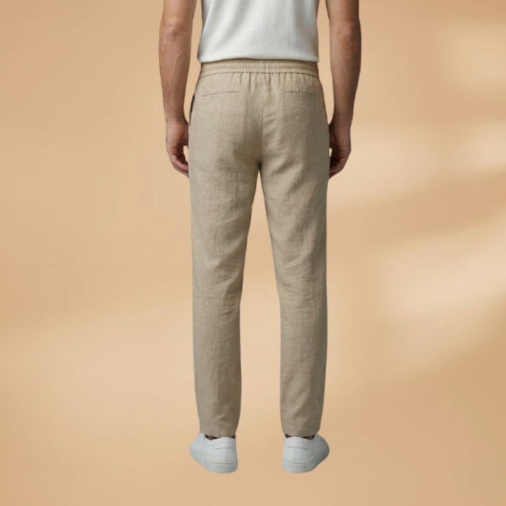 Stylish grey men's trousers featuring a comfortable drawstring waist.