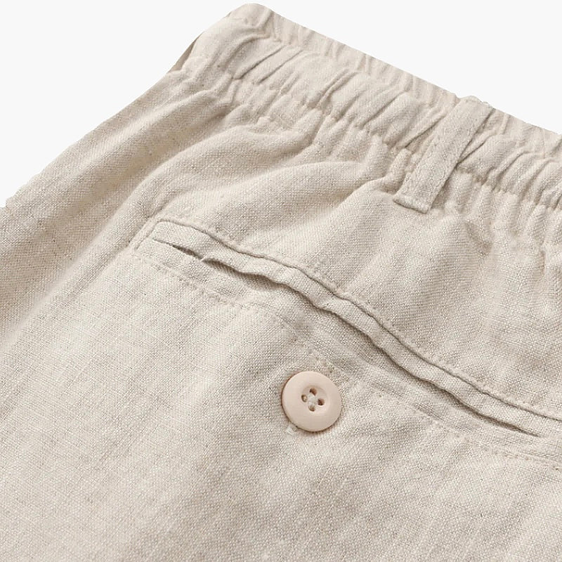 Classic men's chino shorts, relaxed fit with drawstring, versatile for casual outings & summer days.