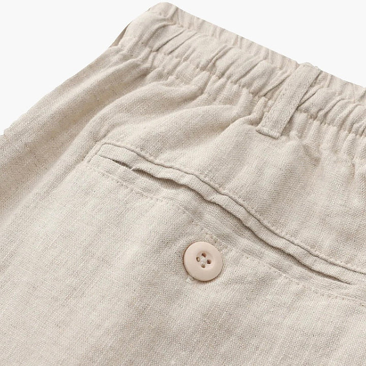 Classic men's chino shorts, relaxed fit with drawstring, versatile for casual outings & summer days.