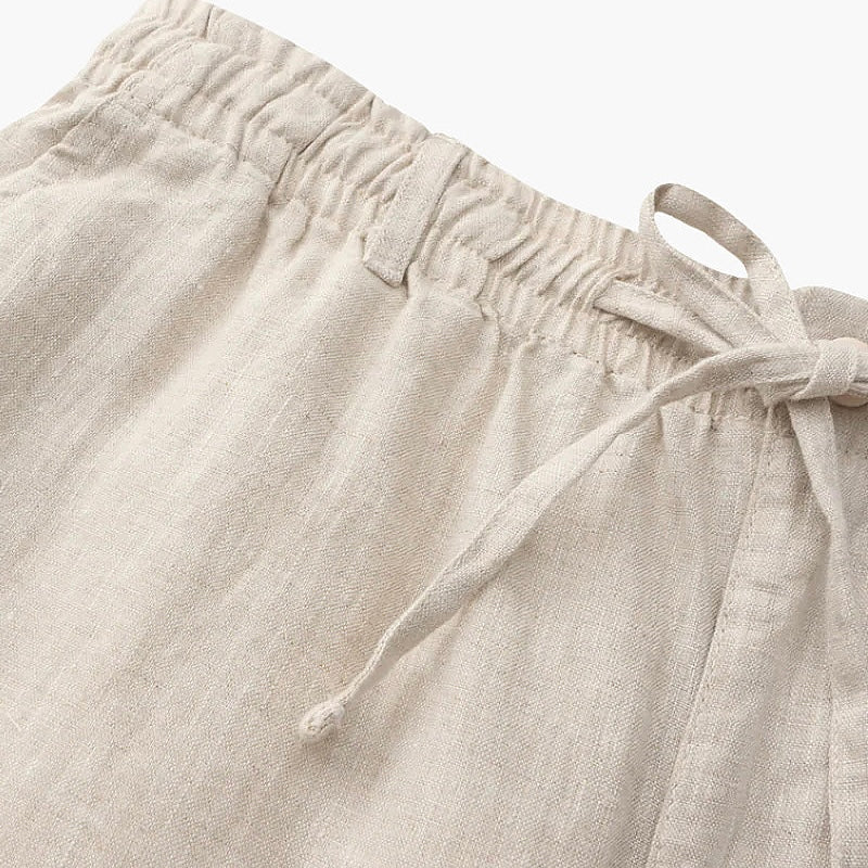 Breathable, comfortable men's drawstring chino shorts, great for warm weather, beach, and casual wear.