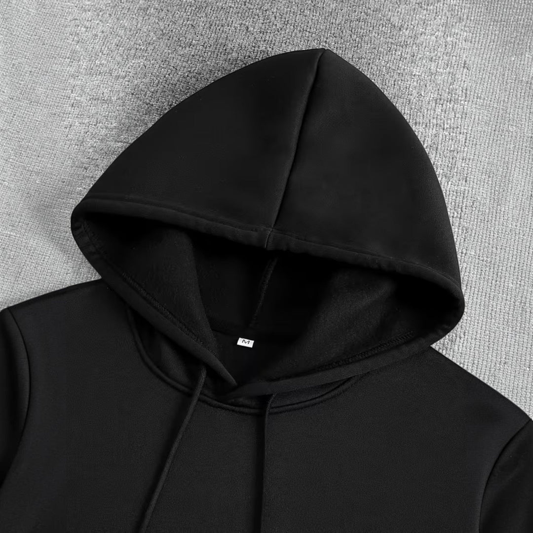 Men's black relaxed fit hoodie, a versatile men's apparel for comfort & casual fashion.