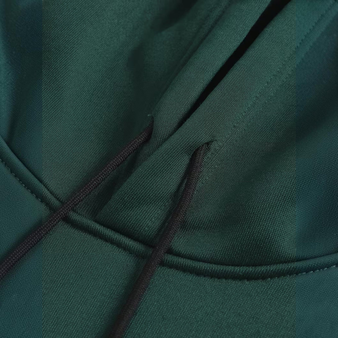Side view of a man wearing a relaxed fit comfort hoodie, showcasing its effortless style.
