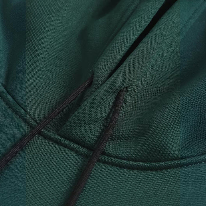 Side view of a man wearing a relaxed fit comfort hoodie, showcasing its effortless style.