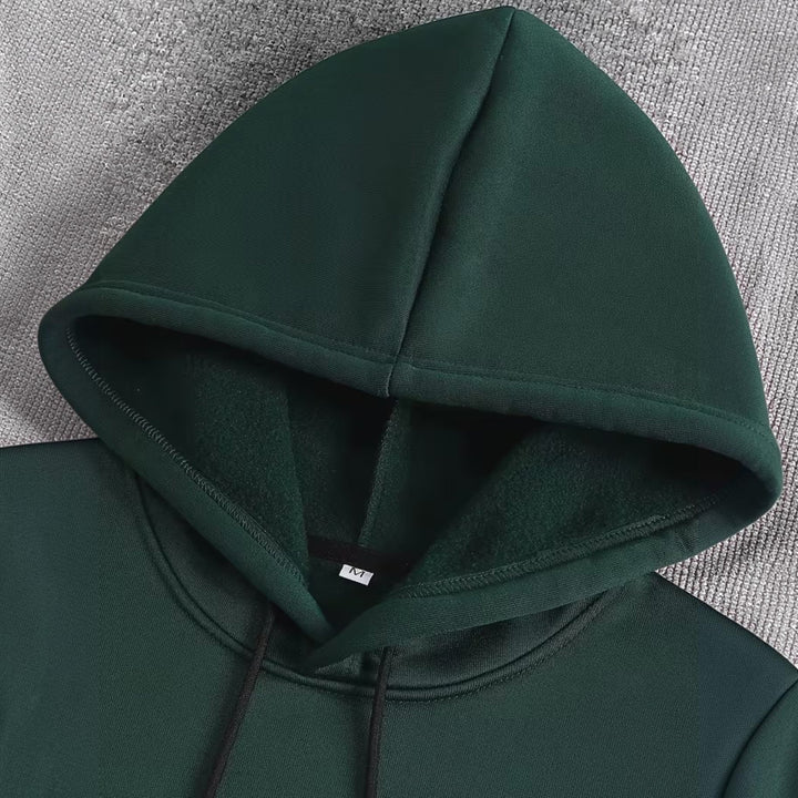 Essential men's comfort hoodie for fall fashion, featuring a relaxed fit & versatile design.