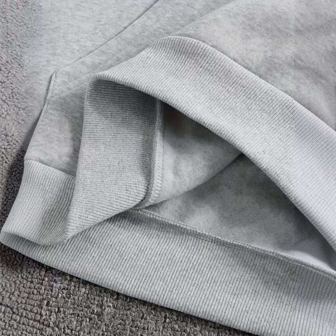 Essential men's comfort hoodie, featuring a relaxed fit for versatile fall & winter wear.