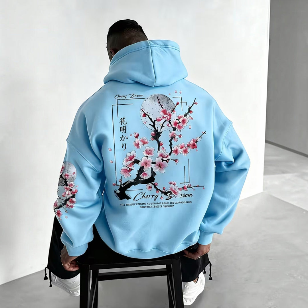 Model wearing a men's relaxed fit hoodie, demonstrating its casual style and comfort.