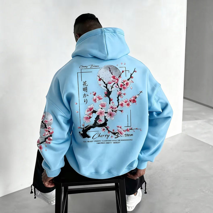Model wearing a men's relaxed fit hoodie, demonstrating its casual style and comfort.