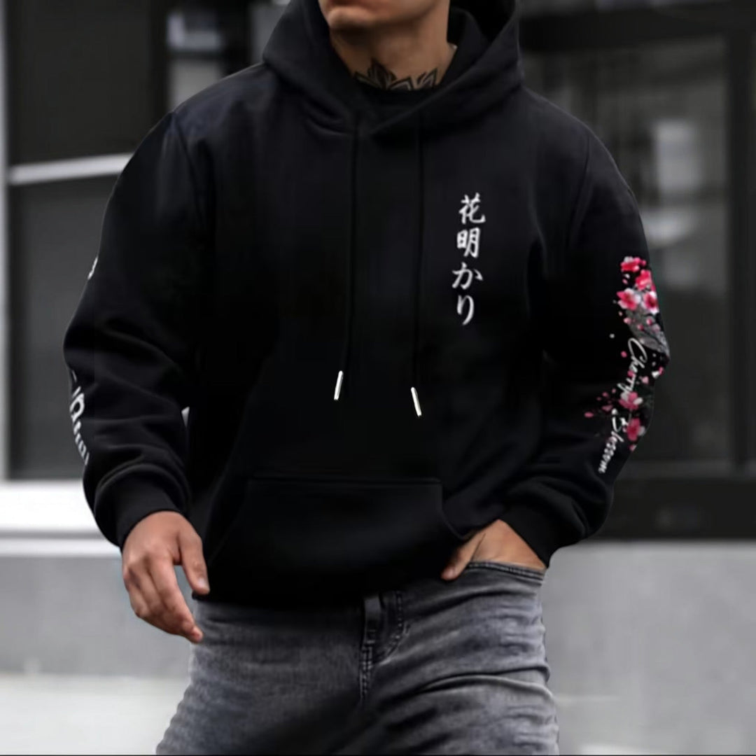 Front view of a men's casual hooded pullover, highlighting its relaxed fit & versatility.
