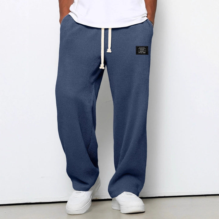 Modern style men's relaxed fit trousers, offering everyday comfort & a straight leg design.