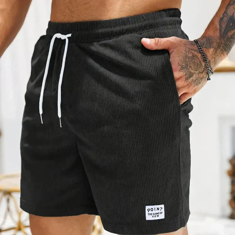 Grey men's drawstring shorts, a casual corduroy essential.