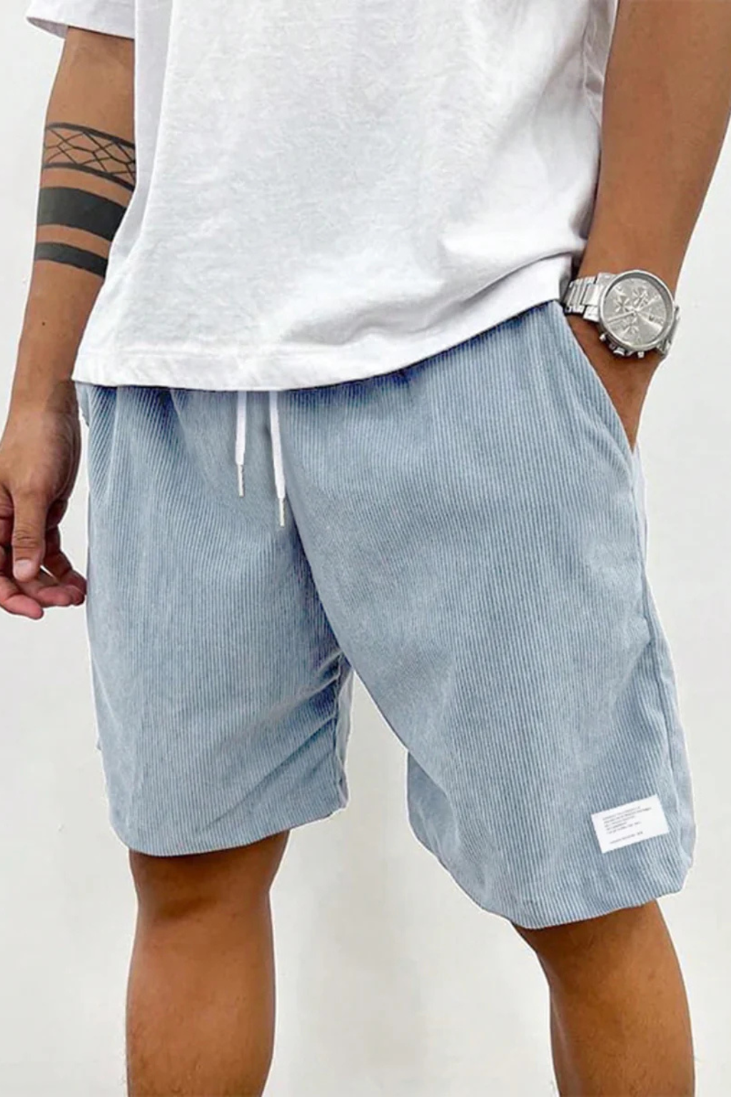 Olive green men's corduroy shorts with a relaxed fit and easy-to-use drawstring.