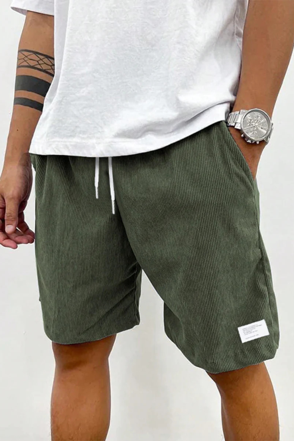 Khaki men's corduroy shorts featuring a comfortable drawstring and relaxed fit.