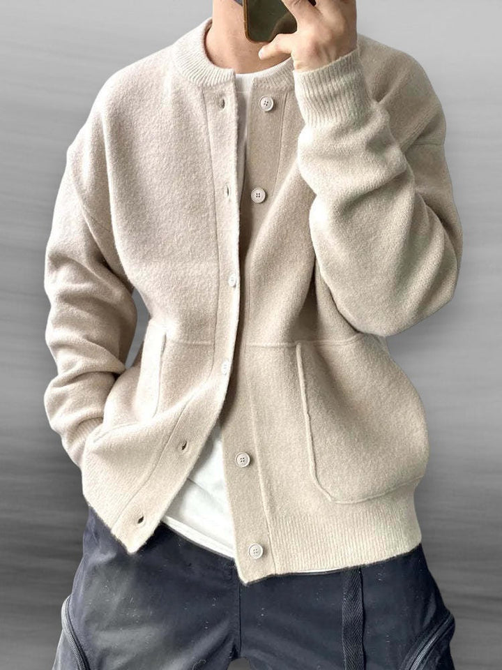 Casual men's button front cardigan sweater, perfect fall fashion layering piece.