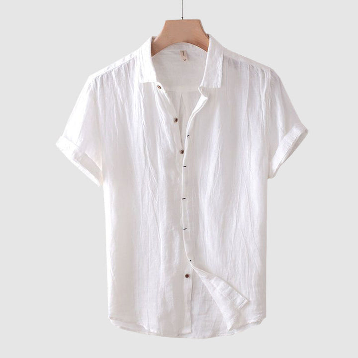 Lightweight men's crinkle short sleeve button-up shirt, relaxed fit, ideal for casual warm weather.
