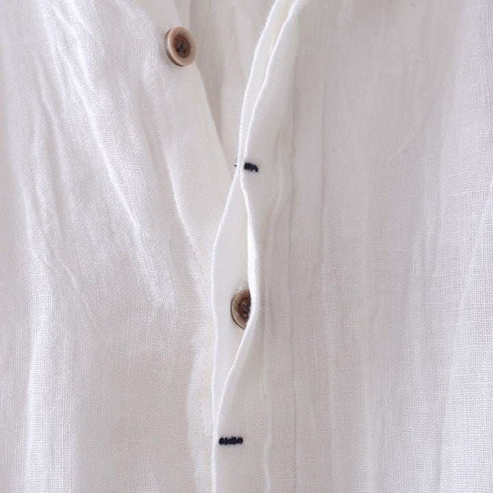 Men's casual relaxed fit button-up crinkle short sleeve shirt, comfortable & lightweight for hot days.