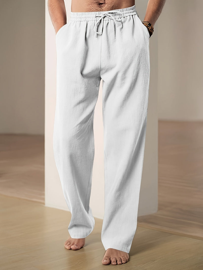 Men's relaxed fit drawstring pants in navy blue, perfect for casual wear.