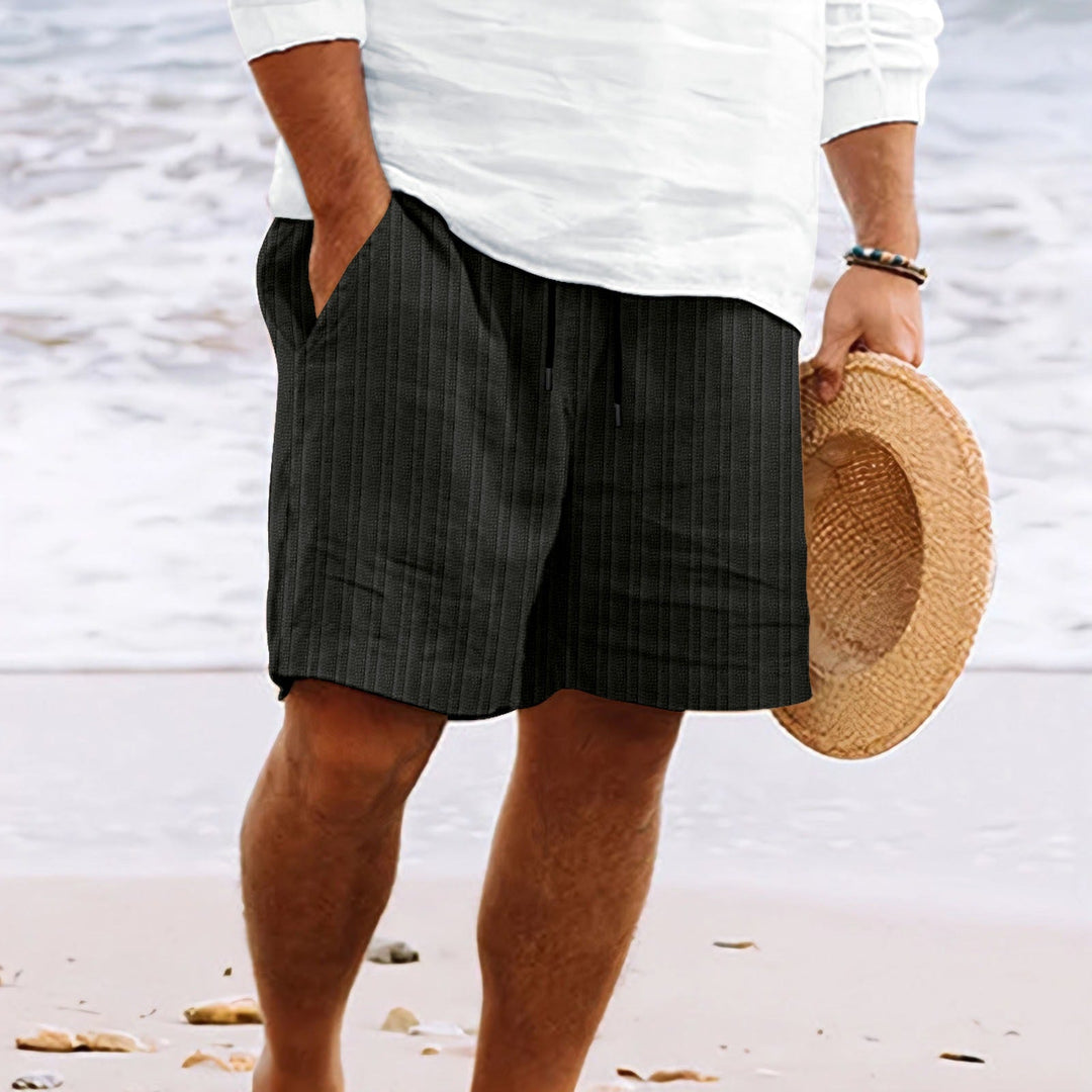 Easy-to-wear men's relaxed fit drawstring shorts, a key piece for any casual summer fashion outfit.