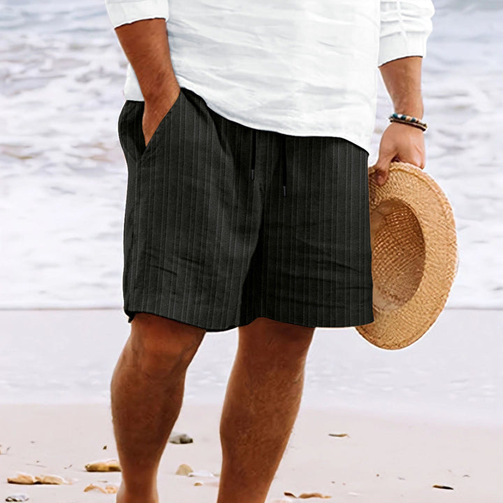 Easy-to-wear men's relaxed fit drawstring shorts, a key piece for any casual summer fashion outfit.