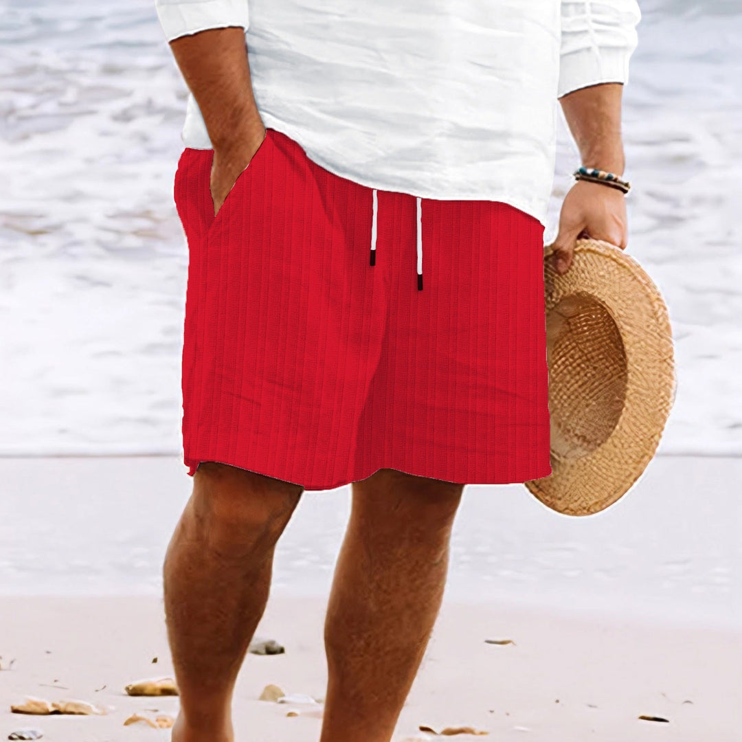 Soft men's relaxed fit drawstring shorts, perfect for lounging or active warm weather casual wear.