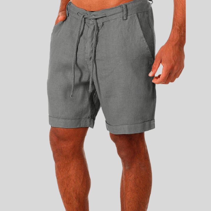 Comfortable mens relaxed fit shorts featuring a drawstring waist, great for lounging & everyday casual wear.