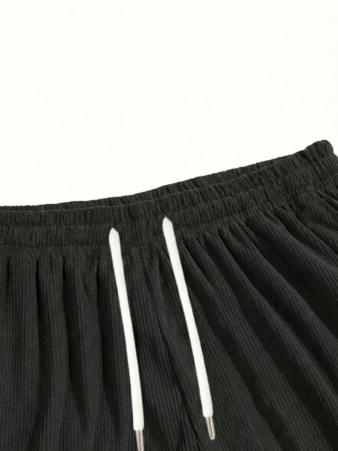 Versatile men's lounge shorts with a comfortable drawstring and relaxed fit, perfect for ultimate relaxation.