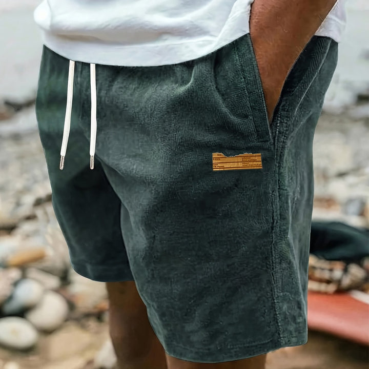Men's practical drawstring shorts for ultimate comfort; relaxed fit, ideal for sports, beach, or casual wear.