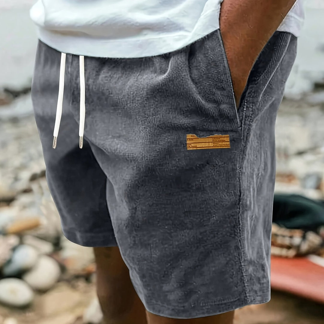 Modern men's relaxed fit shorts with drawstring closure, engineered for ultimate comfort and everyday versatility.