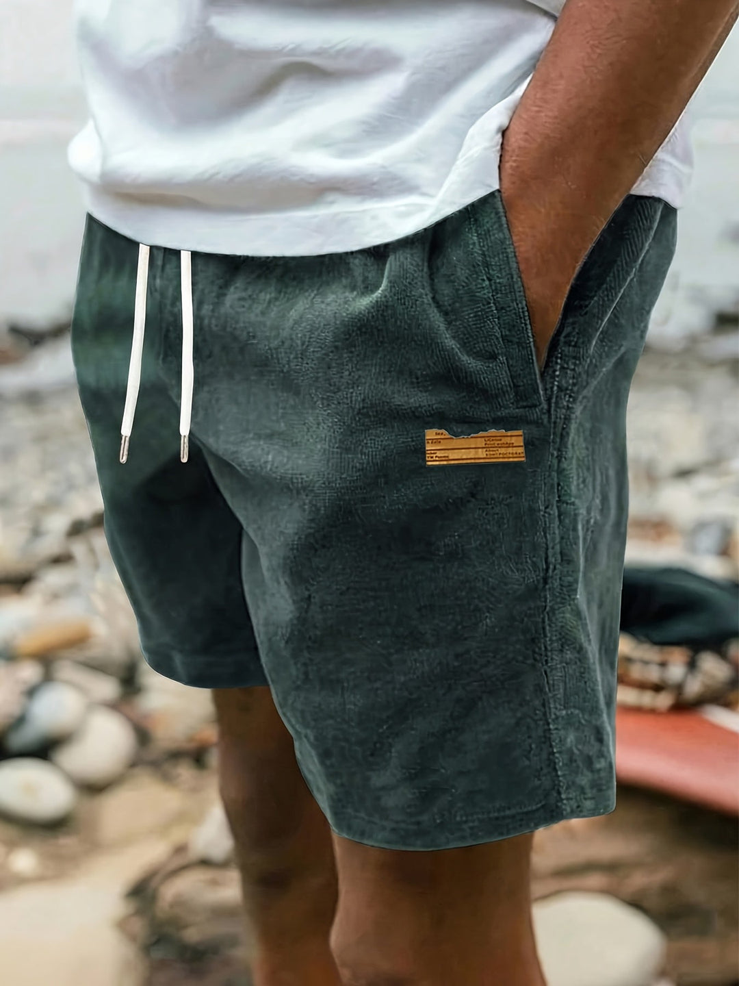 Relaxed fit men's shorts, perfect for summer activities, featuring a secure and comfortable drawstring waist.