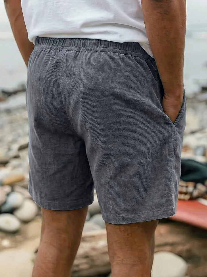 Vacation-ready men's drawstring shorts in a relaxed fit, ensuring ultimate comfort for travel & leisure.