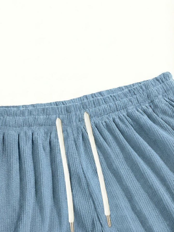 Men's summer drawstring shorts, relaxed fit, offering breathable fabric and ultimate comfort for warm days.