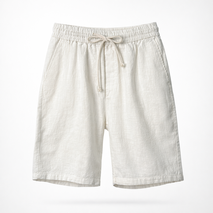 Man in comfortable men's relaxed fit drawstring summer shorts, ideal for a casual, stylish warm-weather look.