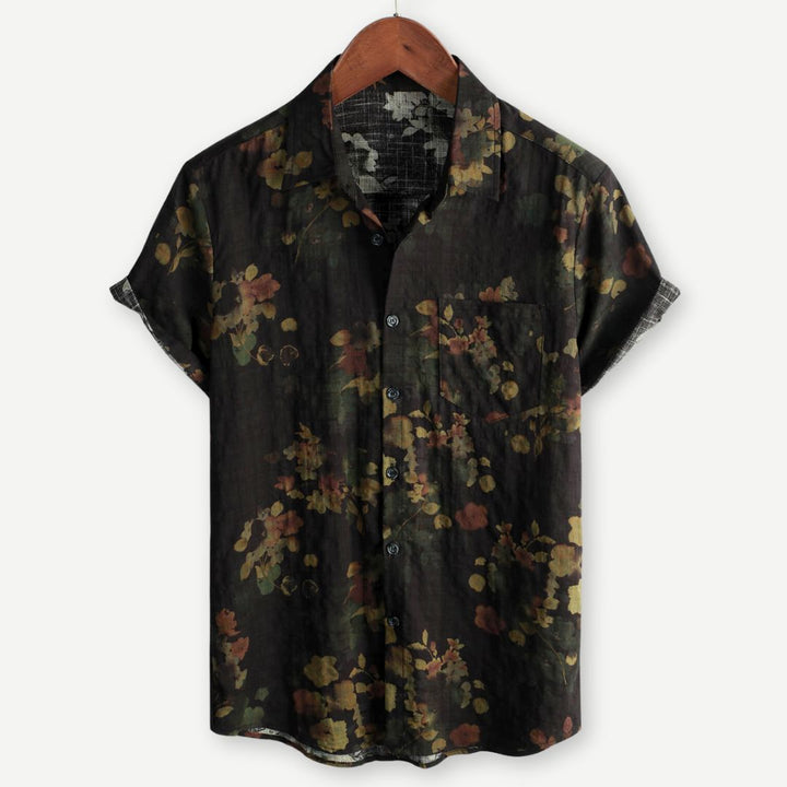 Men's relaxed fit floral short-sleeve shirt. Vibrant green print, perfect for summer casual wear & vacations.