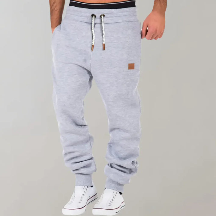 Stylish men's tapered leg joggers for casual wear, athletic activities, or comfortable everyday fashion.