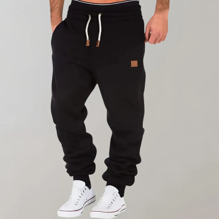 Men's ultimate comfort jogger pants, relaxed fit, tapered leg, and elastic waist for versatile everyday wear.