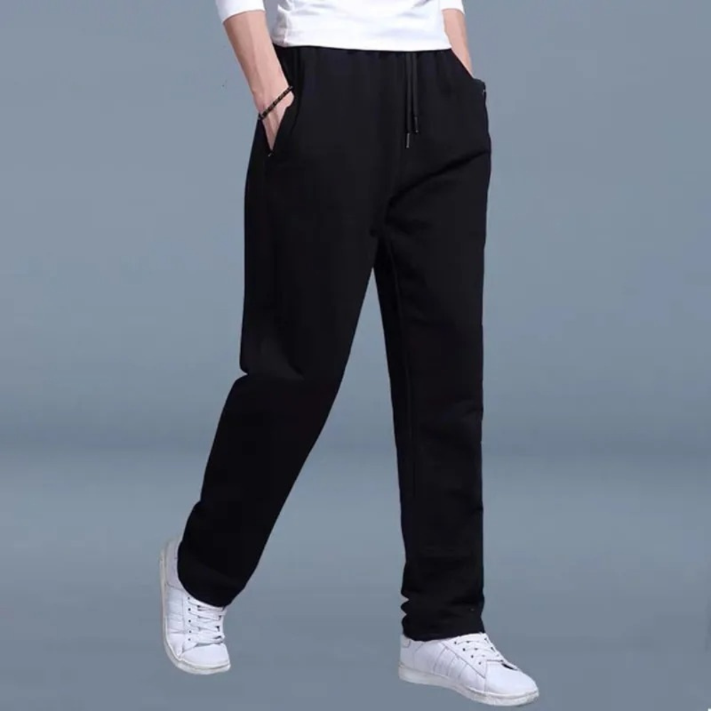 Stylish men's full-length jogging pants with drawstring & elastic waist, relaxed fit design.