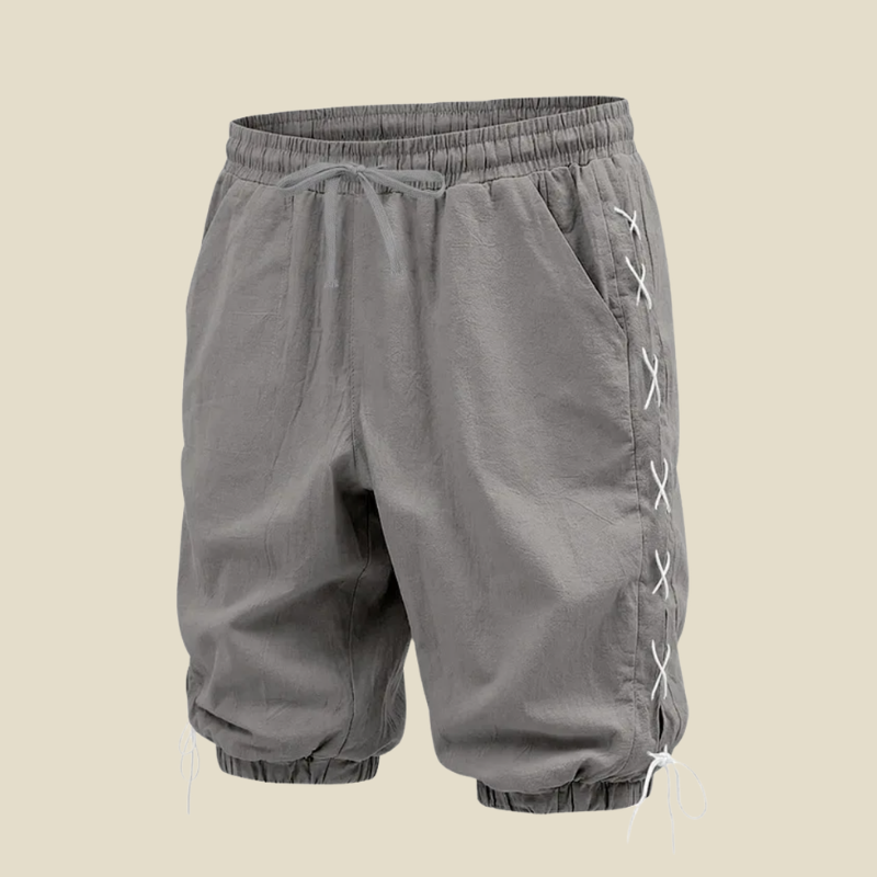 Men's streetwear shorts: relaxed fit, knee-length, with adjustable drawstring and stylish lace-up side detailing.