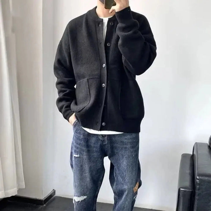 Men's relaxed fit knit cardigan, a comfortable button-up layering piece for any casual or stylish outfit.