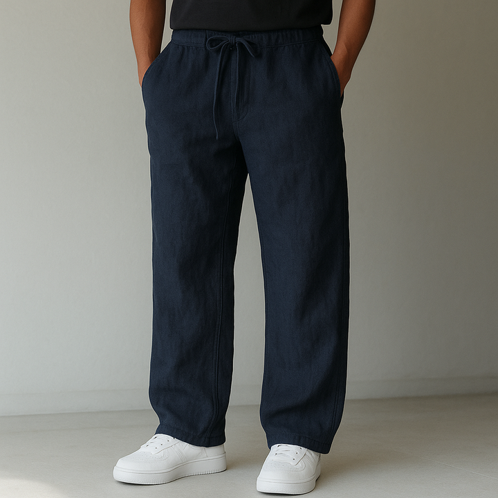 Men's relaxed fit linen trousers with adjustable drawstring waist for summer comfort.