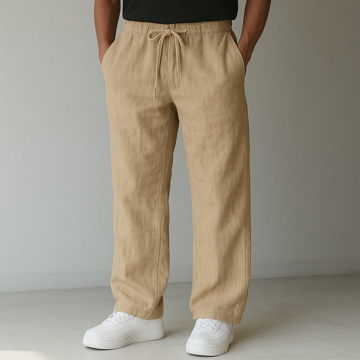 Stylish men's linen trousers featuring a comfortable drawstring closure and relaxed fit.
