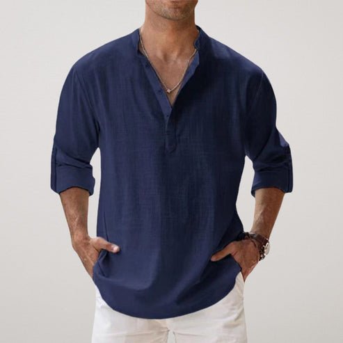 Comfortable men's relaxed fit long sleeve shirt, versatile for casual outings or vacation wear. Button-up style.