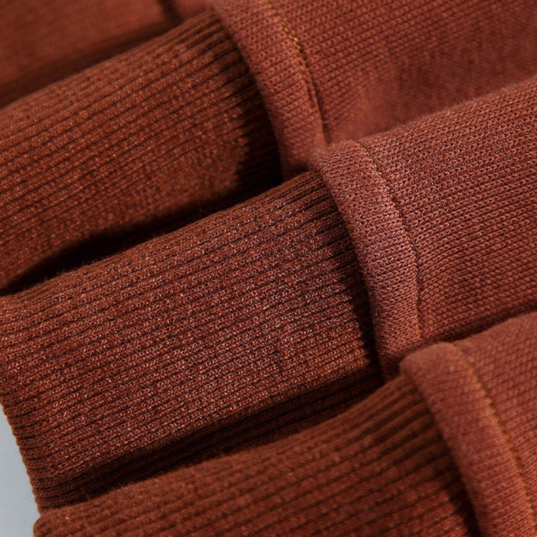 Men's striped relaxed fit polo sweatshirt. Long sleeve, button placket, ideal for casual everyday wear.