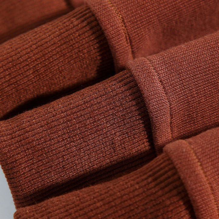 Men's striped relaxed fit polo sweatshirt. Long sleeve, button placket, ideal for casual everyday wear.