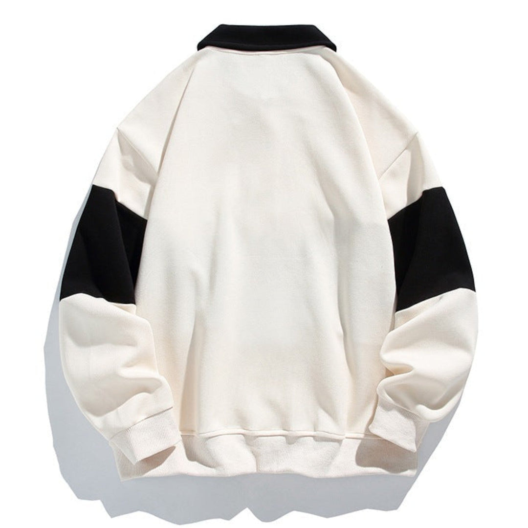 Men's button placket polo sweatshirt, comfortable relaxed fit, long sleeve design for cool weather.