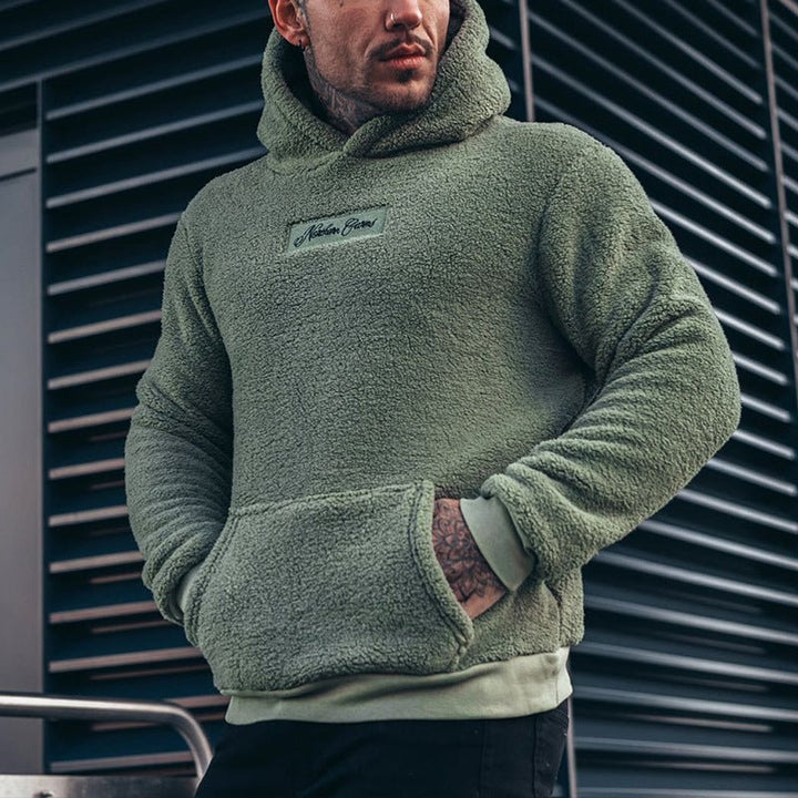 Men's relaxed fit sherpa lined hoodie for ultimate warmth and cozy casual wear.