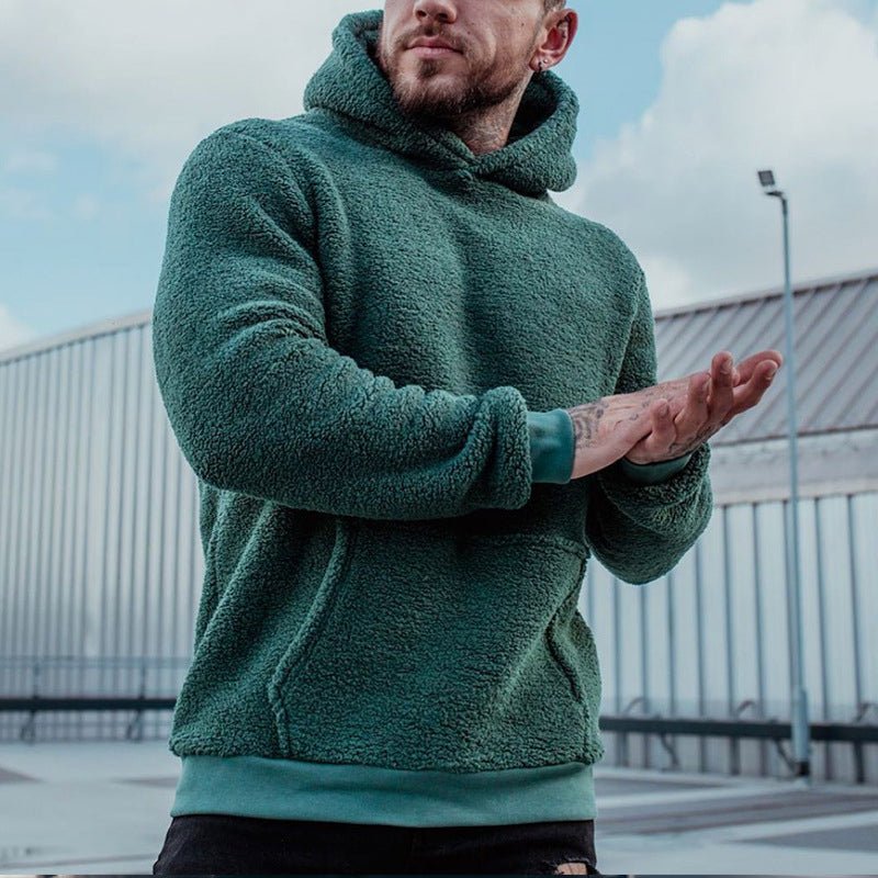 Cozy men's pullover hoodie featuring soft sherpa lining for superior winter warmth.