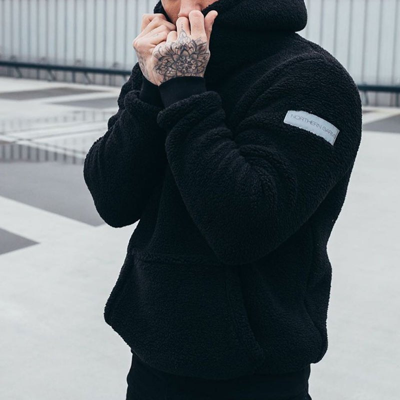 Warm men's casual hoodie in a relaxed fit, perfect for everyday winter apparel.