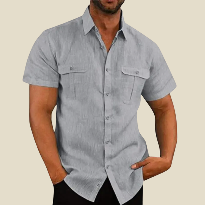 Modern men's collared short sleeve button down, relaxed fit for ultimate comfort. Stylish and all-season versatile.