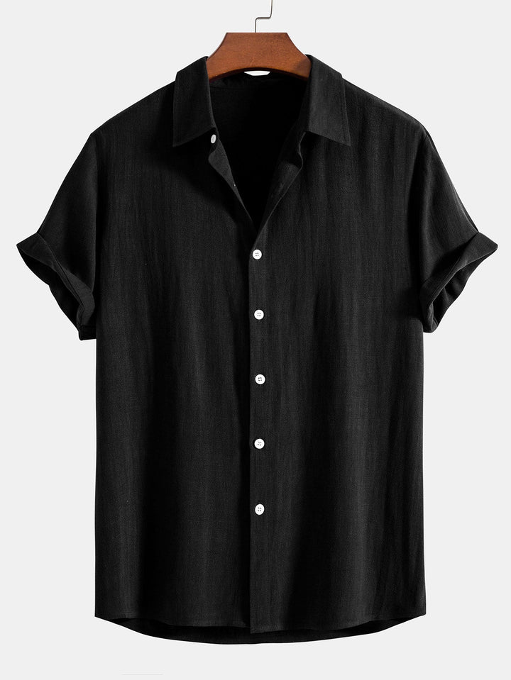Close-up of men's short sleeve button-front shirt with a relaxed fit, ideal for comfortable summer fashion.