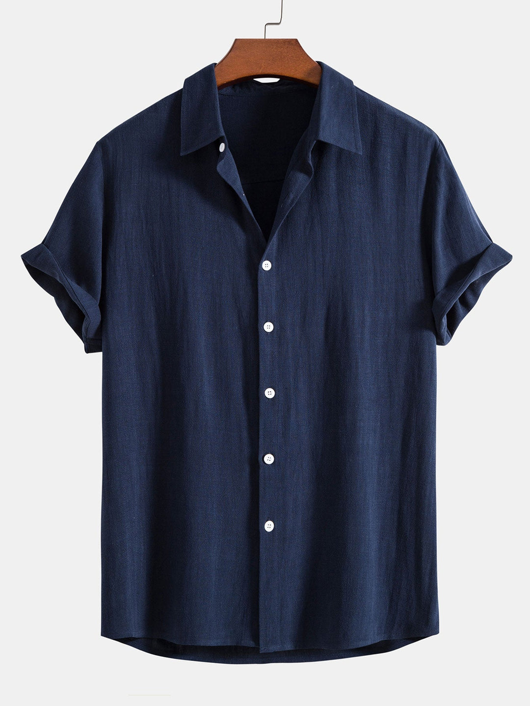 Front view of a versatile men's short sleeve button front shirt in relaxed fit, great for casual summer wear.
